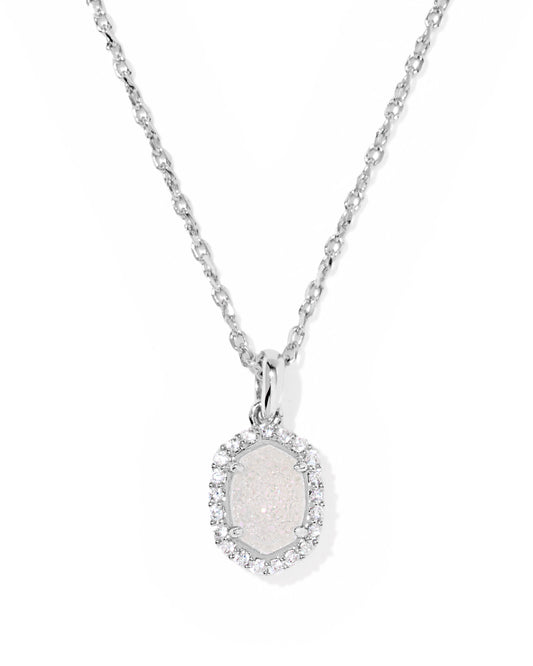 Add a touch of elegance to your jewelry collection with the Kendra Scott - Necklace - Daphne Silver Crystal Frame Short Pendant - Iridescent Drusy. This exquisite piece features a delicate crystal border surrounding a geometric pendant, designed to... - Findlay Rowe Designs