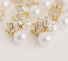 St. Armands -Gold Pearl Sparkler Statement Bow Earrings